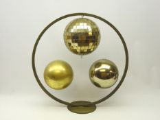 Solar disco display, gold finish disco ball above two other gold finish balls,