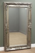 Rectangular bevel edged mirror in silvered swept framed,