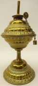 Small brass oil lamp with embossed motif,