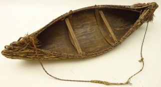 Iroquois model canoe, cedar and birch bark with fibre binding,