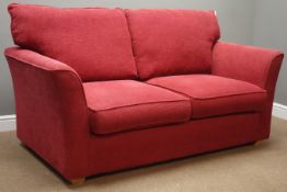 Two seat metal action sofa bed upholstered in claret fabric, W177cm,