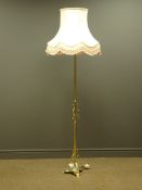 Brass standard lamp with cream shade,