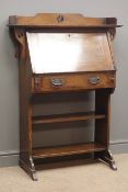 Arts and Crafts oak bureau,fall front above single drawer, storage shelves, two supports, W84cm,