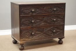 19th century oak three drawer chest, drawer fronts carved with foliage lozenges, on bun feet, W97cm,