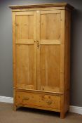 19th century pine double wardrobe, two panelled doors, drawer to base, W111cm, H195cm,
