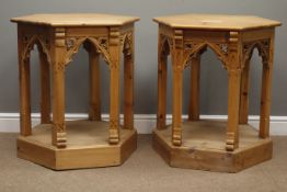 Pair pine Gothic style tables, hexagonal top above carved Gothic arches with under tiers,