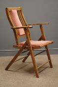 Early 20th century beech folding campaign chair and a reproduction walnut circular wine table on
