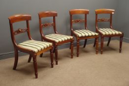 Set four Regency style dining chairs, scroll carved middle rail, upholstered drop in seat,