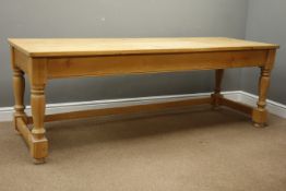 Large rectangular pine Farmhouse style table, turned supports joined by stretchers, W213cm, H74cm,