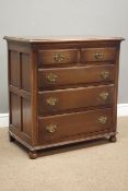 Mid to late 20th century small oak chest with panelled sides, two short and three long drawers,
