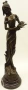 Bronze figure of a maiden collecting flowers after Jean Patou, signed,