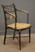 Sheraton style painted armchair, four turned supports with X-shaped stretcher, cane seat,
