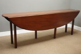 Late 20th century mahogany hunt/wake table, oval drop leaf top,