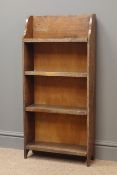 Oak bookcase, scroll cut sides, four shelves, W34cm, H92cm,