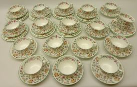 Set of seven Minton 'Haddon Hall' trios with tea plates, nine cups & saucers,