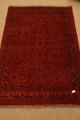 Afghan red and blue ground rug, Herati decorated field with repeating border,