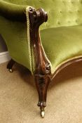 Victorian rosewood settee, serpentine cresting rail carved with flower heads,