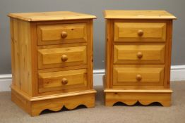 Pair of pine three drawer bedside lamp tables, with turned wooden handles, W44, H57cm,