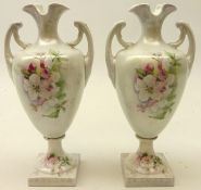 Pair German urn shaped vases, with iridescent pearl glazed bodies and painted with floral sprays,