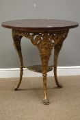 Pub table with circular wooden top on three cast iron Britannia supports, D76cm,