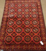 Fine Turkoman red ground rug, decorated with Guls,