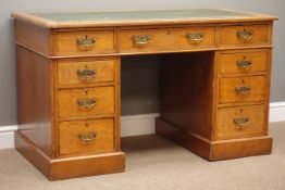 Late 19th century oak twin pedestal desk, nine drawers, green inset leather top, W123cm, H73cm,