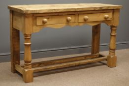 Traditional waxed pine dresser, two drawers, turned supports with stretcher, W130cm, H79cm,