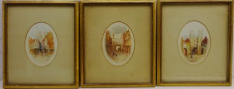 Petergate and Bootham Bar - York, three oval watercolours signed with initials J.W.