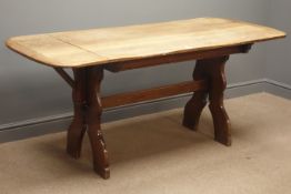 20th century oak drop leaf kitchen table, shaped end supports connected by stretcher, 75cm x 111cm,