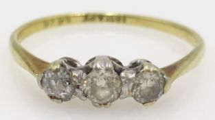 Three stone diamond gold ring, stamped 18ct plat Condition Report Approx 1.