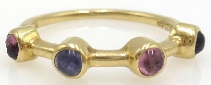 18ct gold ring set with four cabachon precious stones,
