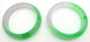 Two apple green and lavender jade bangles Condition Report <a href='//www.