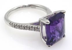 18ct white gold emerald cut purple sapphire ring, with diamond set shoulders hallmarked, sapphire 5.