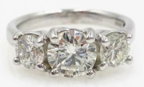 Three stone round brilliant cut diamond, white gold ring hallmarked 18ct,