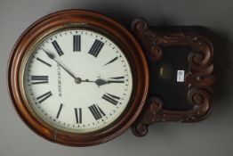 Victorian walnut cased drop dial wall clock, scroll carved and glazed,