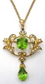 Edwardian gold peridot and seed pearl pendant necklace stamped 15ct Condition Report