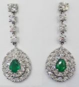 Pair of 18ct white gold pear drop emerald and diamond cluster drop ear-rings hallmarked, emeralds 1.