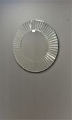 Art Deco style circular mirror with stepped frame,