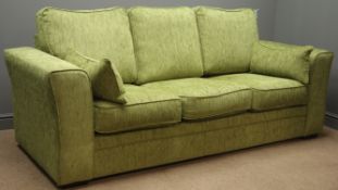 Three seat sofa upholstered in green chenille, W220cm,