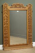 Edwardian oak framed wall mirror, with shaped cresting, carved with foliage, W84cm, H118cm,