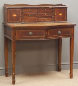 Reproduction inlaid mahogany serpentine front desk, six drawers and two cupboards,