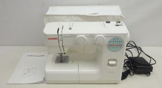 Janome 217-S electric sewing machine with instructions,