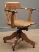 Early 20th century oak adjustable swivel armchair, W66cm, H81cm,