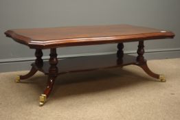Regency style mahogany coffee table on four turned columns,