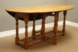 18th century style light oak wake table, oval drop leaf top,
