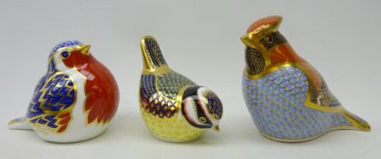 Three Royal Crown Derby paperweights, 'bluetit', 'waxwing' and 'robin', boxed,