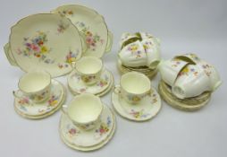 Royal Doulton 'Maytime' part teaware comprising, twelve teacups, eleven saucers,
