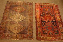 Turkish blue ground geometric design rug (184cm x 113cm), and a Persian rug,