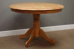 Circular hardwood dining table on turned pedestal base with four splayed supports, D107cm,