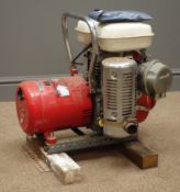 Honda EC1500 generator, mounted on two timber brackets, W45cm, H50cm,